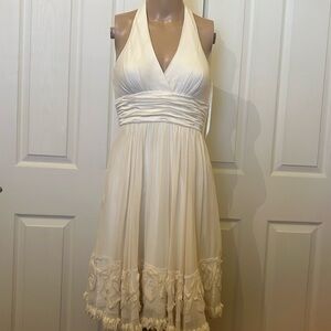 BCBG sz2 cream halter knee length dress . Empire waist. Rose design hem